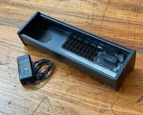 Erica Synths 1 x 84HP skiff case with integrated PSU: black side panels